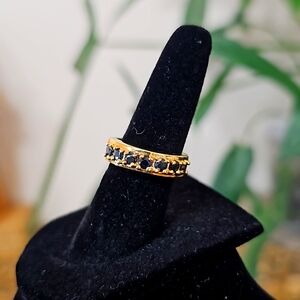 Lovely deep blue sapphire rhodium plated sterling silver ring